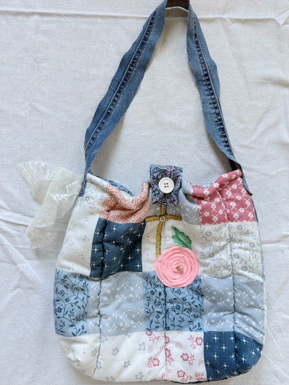 Bible bag with silver button on cross